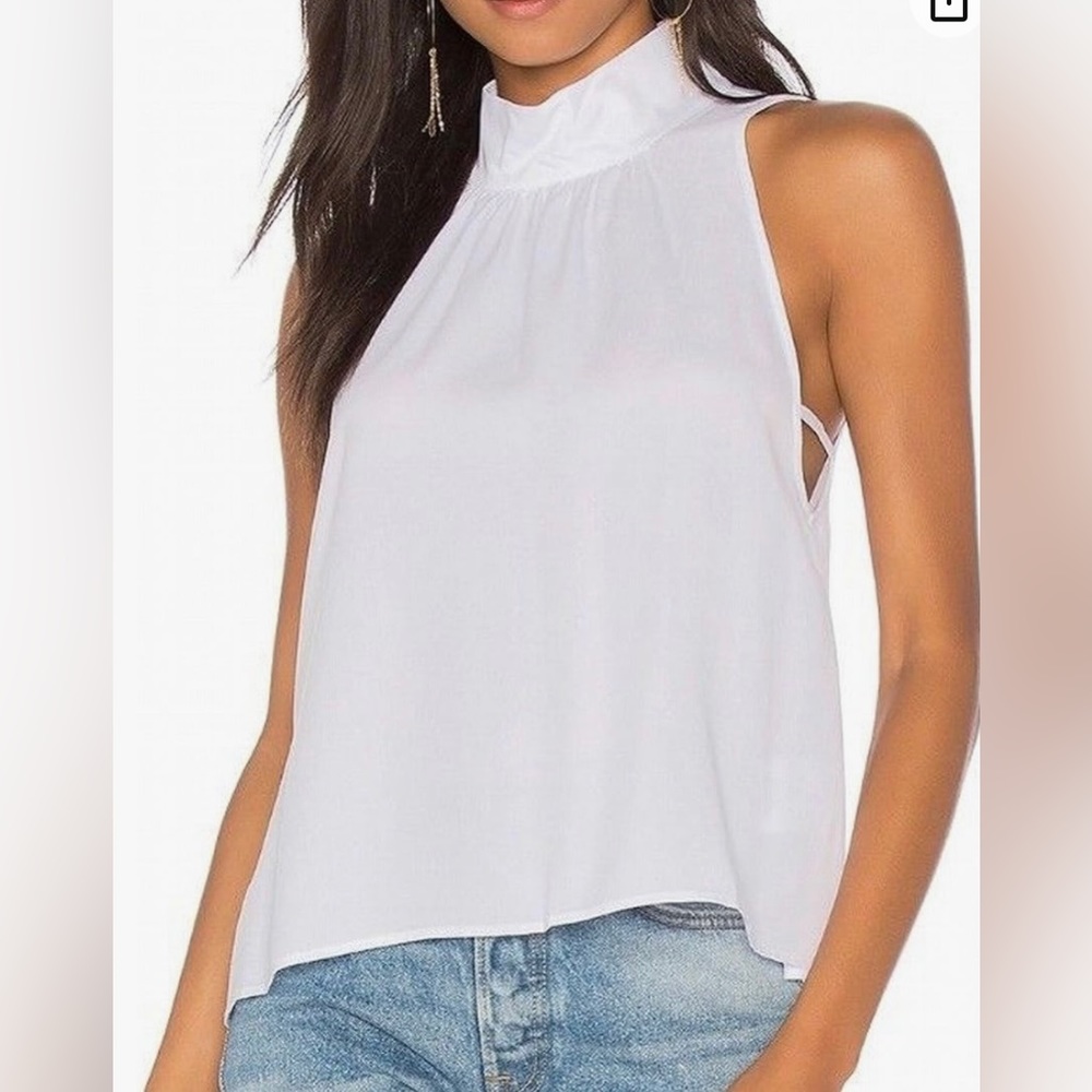 Free People flowy white high neck flowy sleeveless contemporary top. Size XS
